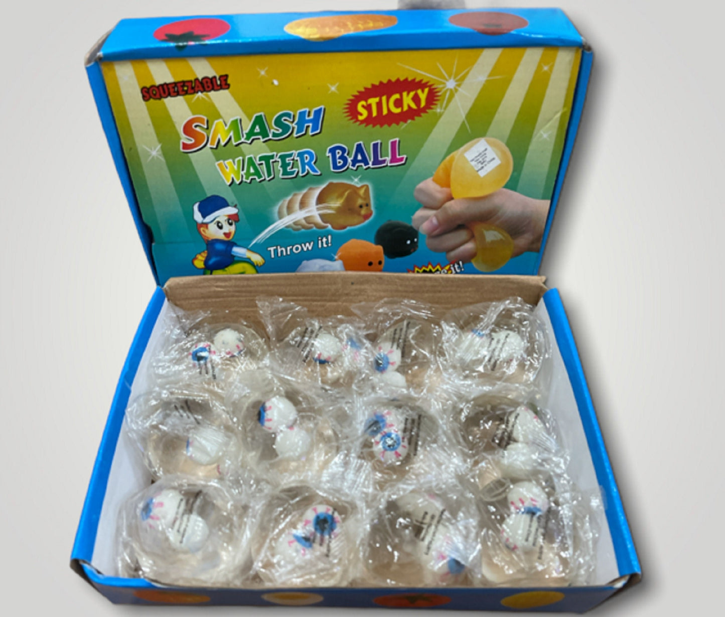 Happy Splat Ball Fun Squeezable Sticky Smash Ball Clear Eyes New 12 Pcs a Box